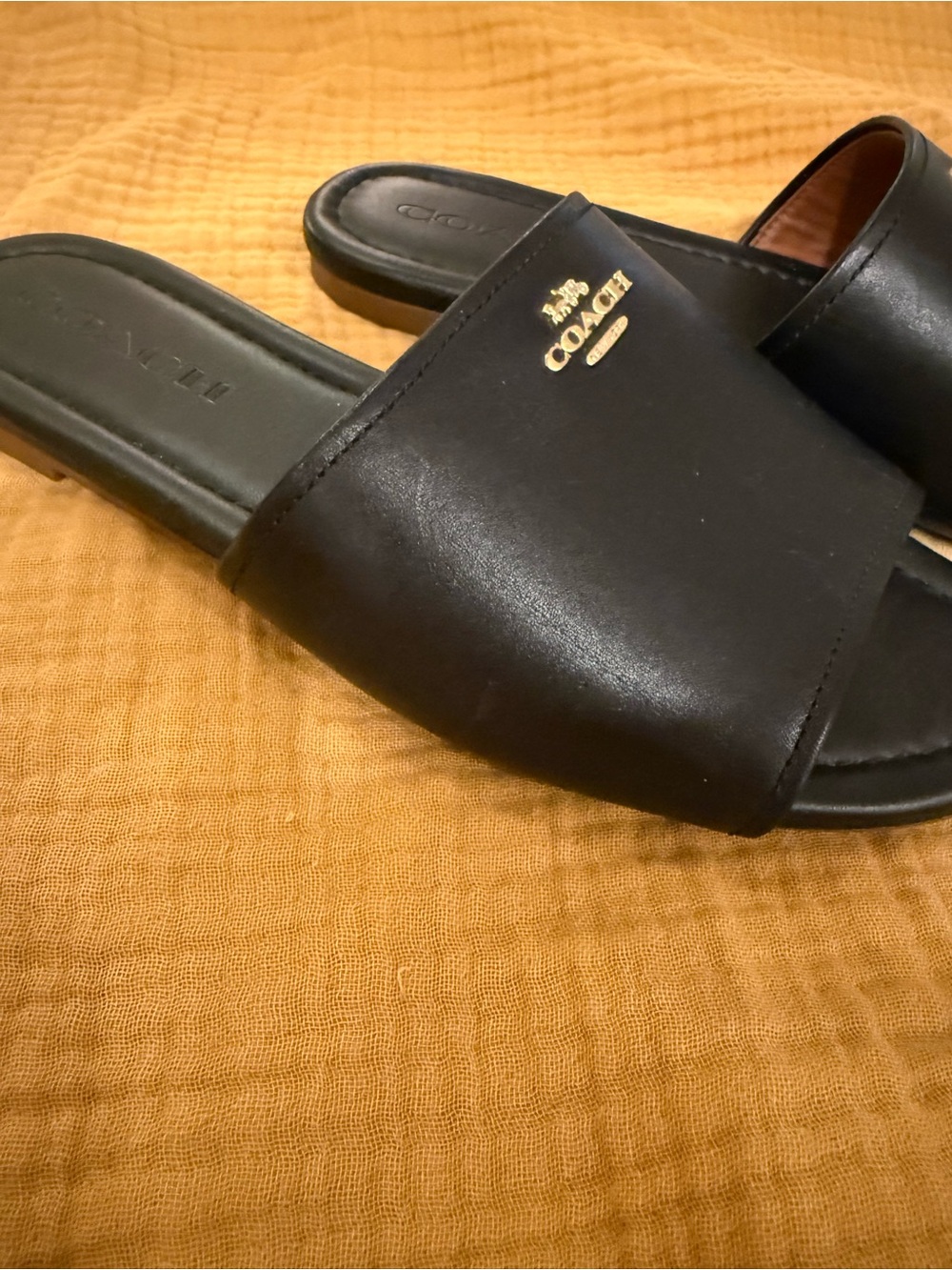 Coach Black Leather Slide Sandals with Gold Logo Accent